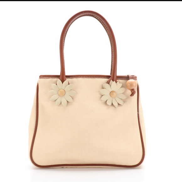 Moschino Brands Small Tote and Wristlet
Clutch in Patent Leather and Canvas - Picture 3 of 8